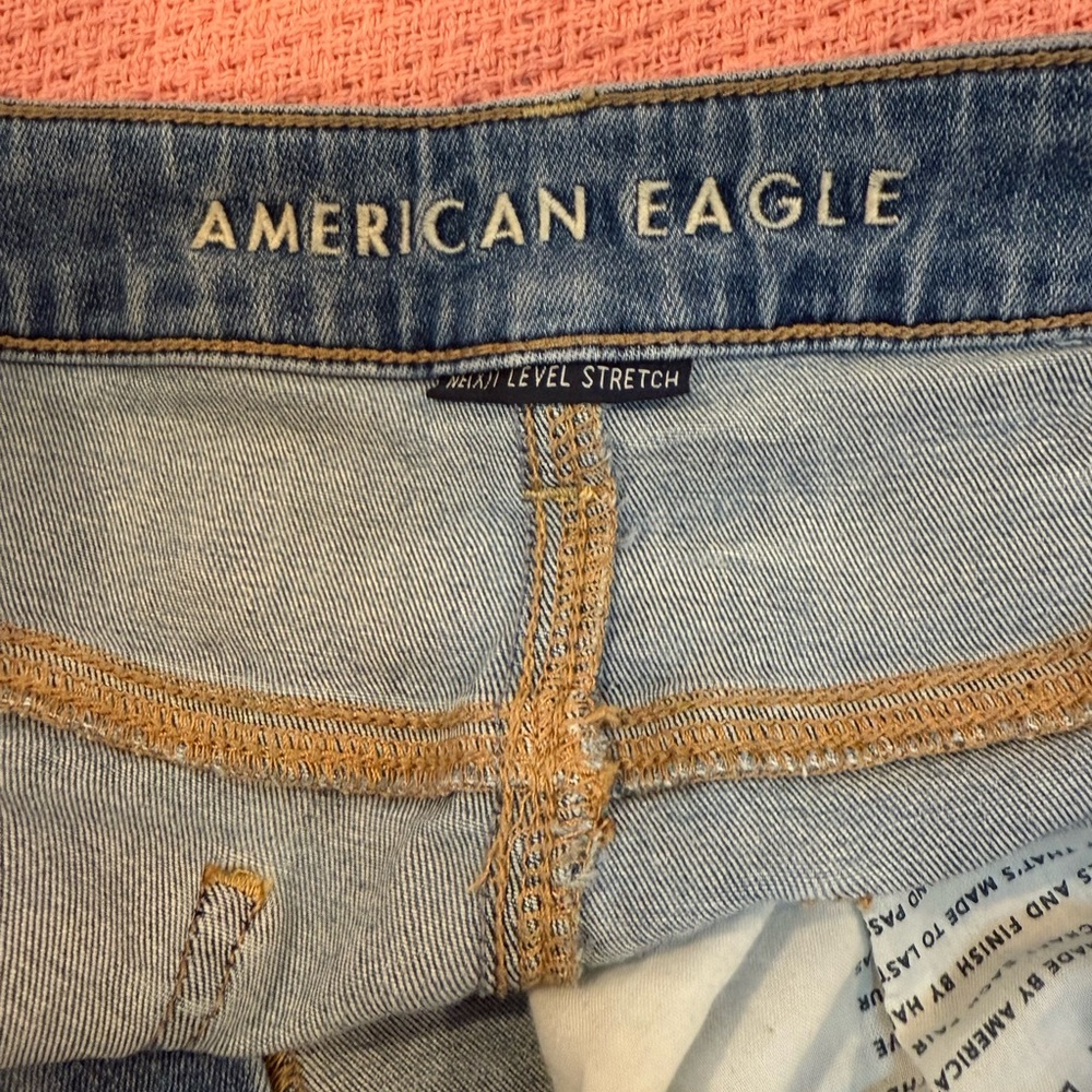 American Eagle next level stretch petite extra short jeans. Extra short,